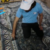 woman carpet cleaning service in karachi